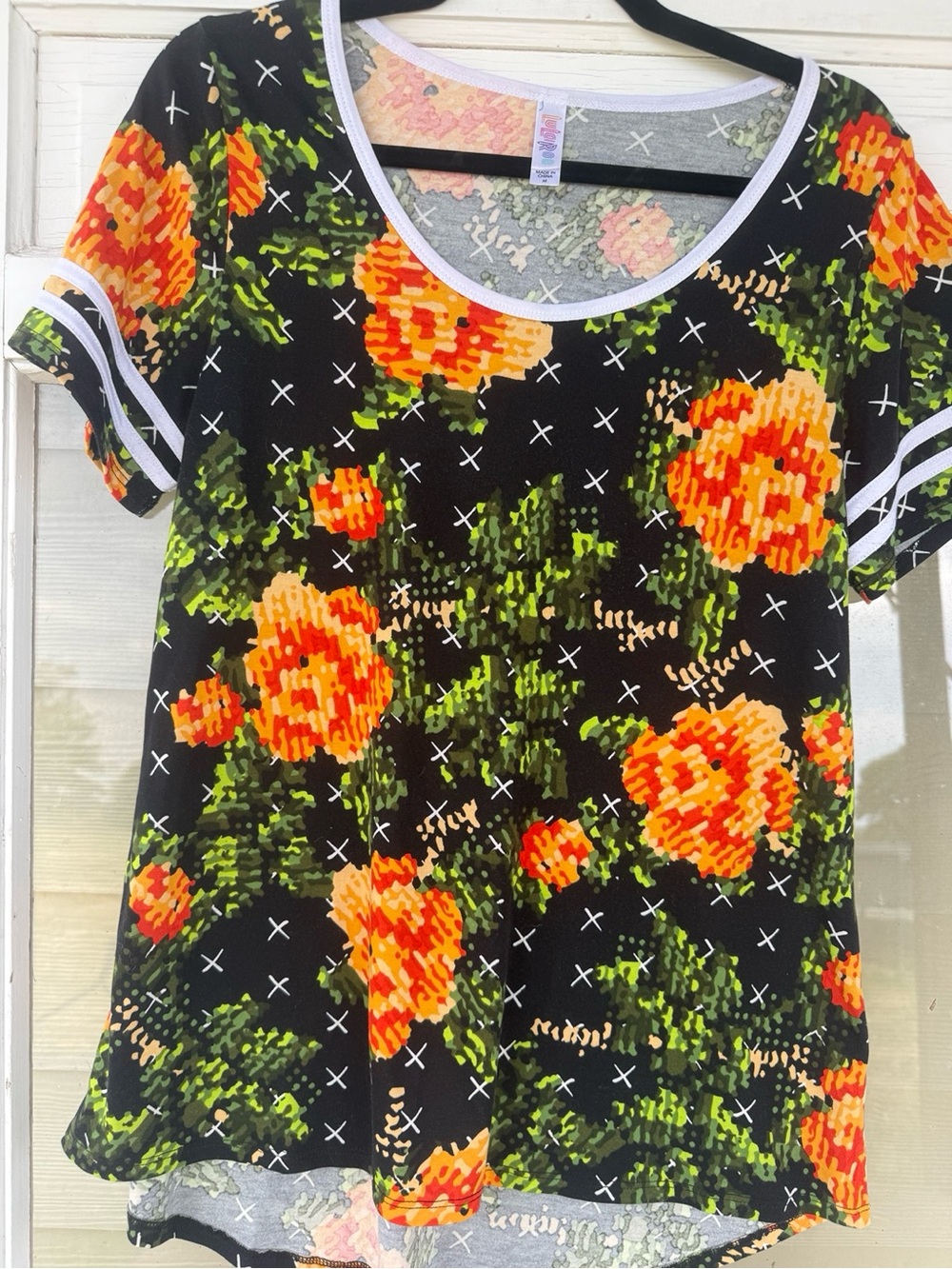LuLaRoe Black Tee with Orange Floral Clusters